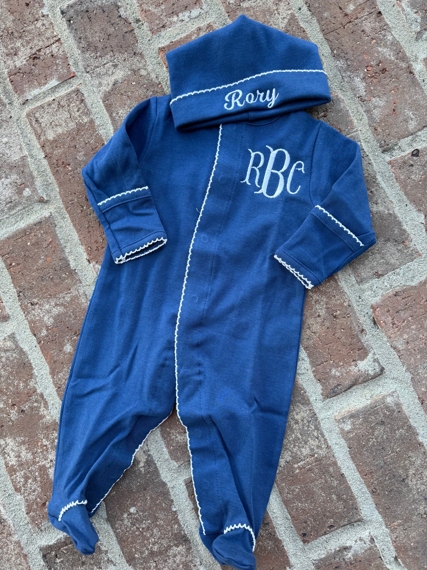 Navy with white picot trim footie and hat