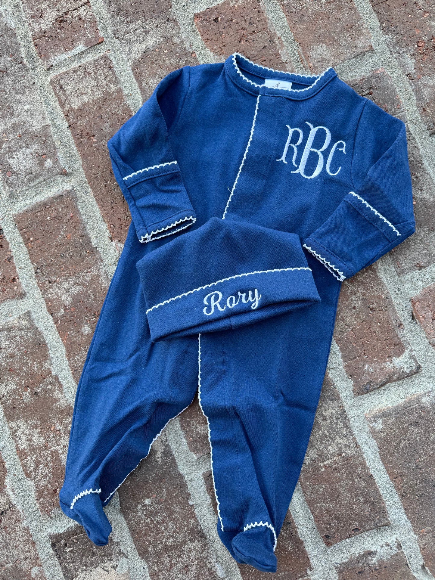 Navy with white picot trim footie and hat